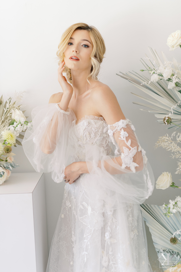 inesdi santo bride wearing off the shoulder belle sleeves
