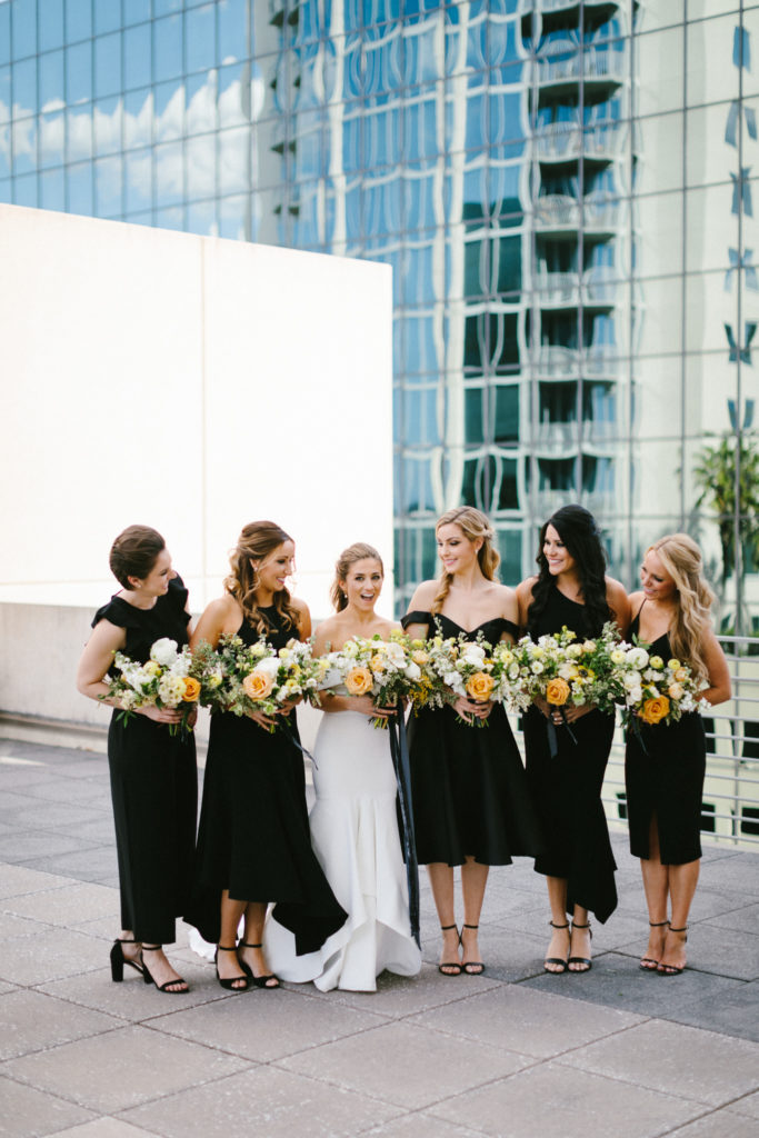 bridesmaids with yellow bouquets 